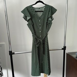 Green and white polka dot dress with belt